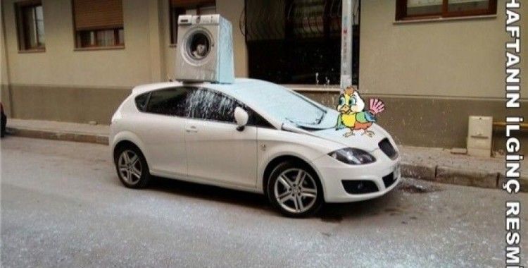 Arabanın üzerine çamaşır makinesi attı