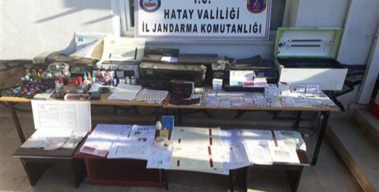 ​Hatay'da sahte pasaport şebekesi çökertildi