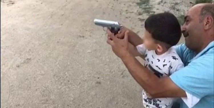 Maganda baba 4 yaşındaki oğluna ateş ettirdi