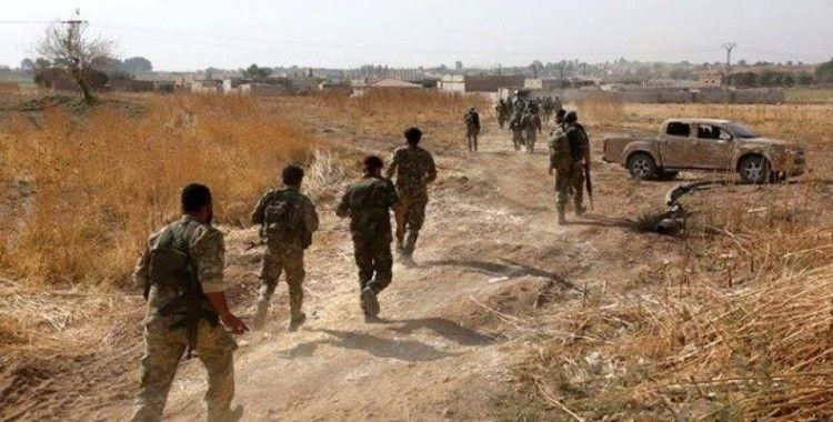 Türk askeri ve Milli Suriye Ordusu şehir merkezinde ilerliyor