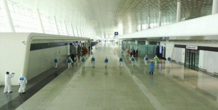 Karantinanın sona ereceği Wuhan'da havaalanı dezenfekte ediliyor