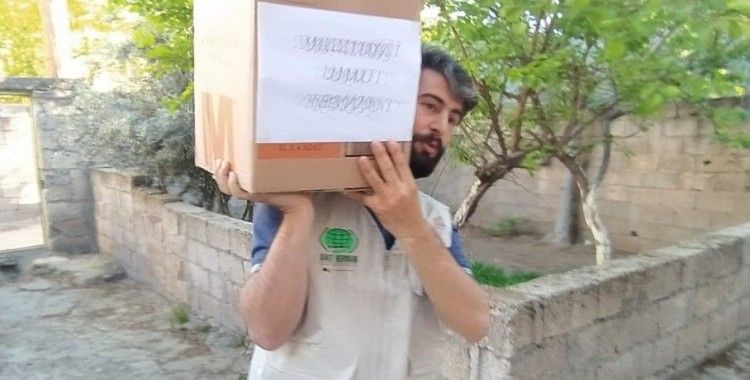 Umut Kervanı Mazıdağı'nda onlarca yetim ve muhtaç aileye gıda paketi dağıttı