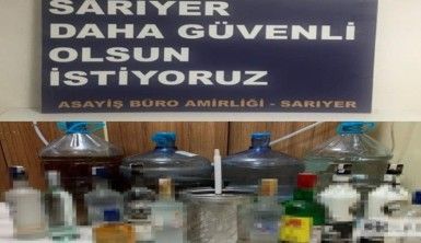 Sarıyer'de ev görünümlü sahte alkol imalathanesine baskın kamerada