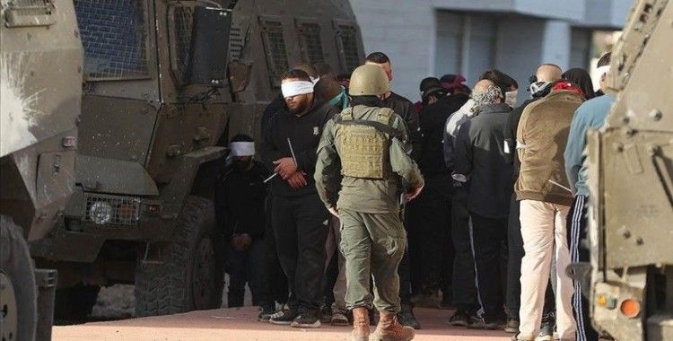 İsrail güçleri, işgal altındaki Batı Şeria'da 14 Filistinliyi gözaltına aldı